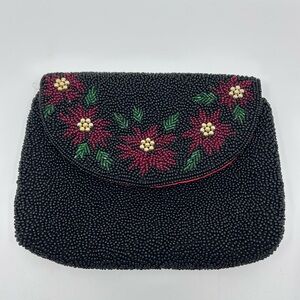 Chic Black Beaded Clutch with Red Floral Accents